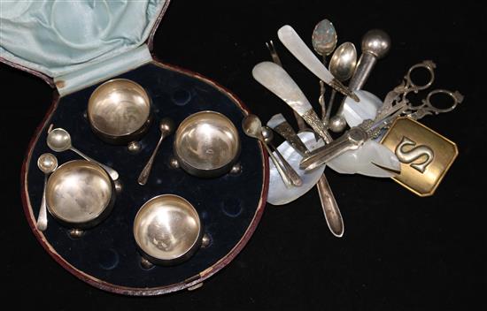 A cased set of four Victorian silver condiments, pair of silver grape shears and other items.